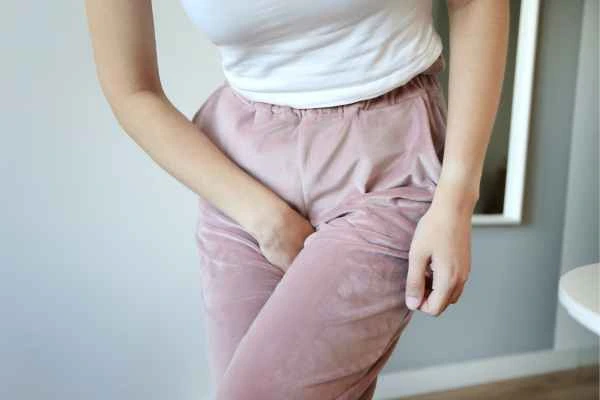 woman struggling with urine incontinence Bognor Regis